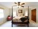 Spacious bedroom with a four-poster bed, ceiling fan, and ensuite bathroom at 2622 Oakhurst Dr # 23, Rock Hill, SC 29730