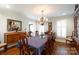 Elegant dining room featuring a large table and hardwood floors at 2622 Oakhurst Dr # 23, Rock Hill, SC 29730