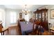Elegant dining room with hardwood floors, a large table, and decorative hutch at 2622 Oakhurst Dr # 23, Rock Hill, SC 29730
