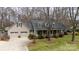 Charming home with a well-manicured lawn, a covered front porch, and an attached two-car garage at 2622 Oakhurst Dr # 23, Rock Hill, SC 29730