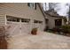 A two car garage features carriage doors and ample space for parking and storage at 2622 Oakhurst Dr # 23, Rock Hill, SC 29730