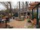 Outdoor entertaining space with built-in grill and patio seating surrounded by trees at 2622 Oakhurst Dr # 23, Rock Hill, SC 29730