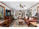 Bright sunroom with large windows, wood floors, and comfortable seating at 2622 Oakhurst Dr # 23, Rock Hill, SC 29730