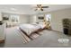 Serene main bedroom with neutral tones, large windows, stylish furniture, and ample natural light at 2683 Beulah Church Rd, Matthews, NC 28104