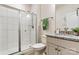 This bathroom features a standing shower, granite counters, and white cabinets at 3193 Burnello Ct, Iron Station, NC 28080