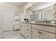 A stylish bathroom with double sinks, granite countertops, and a large mirror at 3193 Burnello Ct, Iron Station, NC 28080