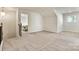 Spacious bonus room features neutral carpeting and a door that leads to a bedroom at 3193 Burnello Ct, Iron Station, NC 28080