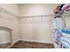 A walk-in closet features wire shelving, hardwood floors, and space for lots of storage at 3193 Burnello Ct, Iron Station, NC 28080