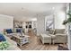An open floor plan connects the living room, dining area, and kitchen at 3193 Burnello Ct, Iron Station, NC 28080