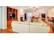 Bright and airy living space with hardwood floors, a fireplace, and open to the kitchen at 41108 Calla Lily St, Fort Mill, SC 29707