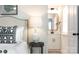 En suite bathroom with modern vanity and black hardware detailing, located off the primary bedroom at 5127 Izzo Ln, Charlotte, NC 28214