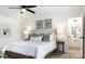 Well lit primary bedroom with en suite bathroom featuring double vanity at 5127 Izzo Ln, Charlotte, NC 28214