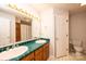 Bathroom features double sinks, tile countertops and flooring, and a separate water closet at 538 30Th Avenue Ne Cir, Hickory, NC 28601