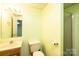 Cozy bathroom with a single vanity, a toilet, and a shower at 538 30Th Avenue Ne Cir, Hickory, NC 28601