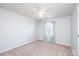 This bedroom features neutral walls, carpet and a ceiling fan at 538 30Th Avenue Ne Cir, Hickory, NC 28601
