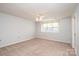 This bedroom features neutral walls, carpet and a ceiling fan for maximum comfort at 538 30Th Avenue Ne Cir, Hickory, NC 28601