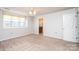 This bedroom includes an ensuite bathroom and a ceiling fan at 538 30Th Avenue Ne Cir, Hickory, NC 28601
