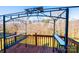 Outdoor deck with wooden railing and metal canopy at 538 30Th Avenue Ne Cir, Hickory, NC 28601