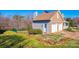 A well-maintained home with an attached two-car garage and a landscaped yard with blooming flowers at 538 30Th Avenue Ne Cir, Hickory, NC 28601
