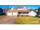 Charming two-story home featuring a brick facade, covered porch, two-car garage, and well-manicured lawn at 538 30Th Avenue Ne Cir, Hickory, NC 28601