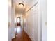 Hallway with hardwood floors, closet doors and front door view at 538 30Th Avenue Ne Cir, Hickory, NC 28601