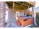Exterior of a home featuring a private outdoor hot tub on a patio with brick exterior at 538 30Th Avenue Ne Cir, Hickory, NC 28601
