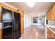 Open-concept kitchen with oak cabinets and modern appliances flows seamlessly into a large, inviting living space at 538 30Th Avenue Ne Cir, Hickory, NC 28601
