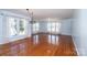 Large living room featuring beautiful hardwood floors, and lots of natural light from oversized windows at 538 30Th Avenue Ne Cir, Hickory, NC 28601