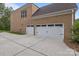 Two car garage with an extended driveway at 561 Keystone Nw Ct, Concord, NC 28027