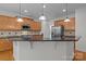 Well-equipped kitchen with granite countertops, stainless steel appliances, and ample cabinet space at 561 Keystone Nw Ct, Concord, NC 28027