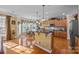 Well-lit kitchen featuring a breakfast bar, pendant lighting, and stainless steel appliances at 561 Keystone Nw Ct, Concord, NC 28027