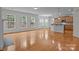 Spacious living room with hardwood floors and bright natural light at 561 Keystone Nw Ct, Concord, NC 28027