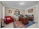 Cozy home office with a classic wooden desk, a plush chair and decorative elements at 561 Keystone Nw Ct, Concord, NC 28027