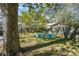 Spacious backyard featuring a circle of Adirondack chairs at 642 W Front St, Statesville, NC 28677