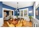 Bright and inviting dining room with large windows, perfect for enjoying meals with Gathering and friends at 642 W Front St, Statesville, NC 28677