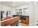 Traditional kitchen features tiled floor, granite countertops, black appliances, ceiling fan and plentiful natural light at 642 W Front St, Statesville, NC 28677