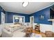 Comfortable living room with ample natural light, perfect for relaxing and entertaining guests at 642 W Front St, Statesville, NC 28677