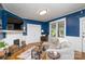 Cozy living room featuring a fireplace, stylish decor, and comfortable seating, creating a welcoming atmosphere at 642 W Front St, Statesville, NC 28677