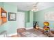 Inviting sitting room with ample space, hardwood floors, and a guitar stand in the corner at 642 W Front St, Statesville, NC 28677