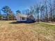 Charming single-story home with a landscaped front yard and inviting entryway at 733 Baker St, Kannapolis, NC 28081