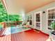 Covered deck with outdoor furniture and lighting, perfect for entertaining at 821 Lynnwood Farms Dr, Fort Mill, SC 29715