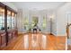 Cozy living room filled with natural light, showcasing hardwood floors and stylish furniture at 821 Lynnwood Farms Dr, Fort Mill, SC 29715