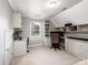 Office with built in desk and shelving along walls and natural lighting at 821 Lynnwood Farms Dr, Fort Mill, SC 29715
