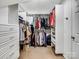 Organized walk-in closet featuring multiple shelves, drawers, hanging rods, and plenty of storage space at 821 Lynnwood Farms Dr, Fort Mill, SC 29715