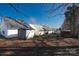 Large backyard with potential for gardening and outdoor activities, surrounded by mature trees at 8421 Kings Creek Dr, Charlotte, NC 28273