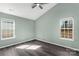 Bedroom featuring hardwood floors, vaulted ceiling, ceiling fan, and natural light at 8421 Kings Creek Dr, Charlotte, NC 28273