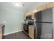 Well-equipped kitchen with stainless steel appliances, granite countertops, and hardwood floors at 8421 Kings Creek Dr, Charlotte, NC 28273