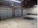 Interior of the three-car garage, featuring ample space for vehicles, and work area at 927 Locke St, Salisbury, NC 28144