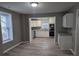 Open kitchen with white cabinets, granite countertops, updated appliances, and ample storage at 927 Locke St, Salisbury, NC 28144