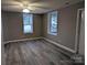 Inviting living room with hardwood floors, neutral paint, and ample natural light at 927 Locke St, Salisbury, NC 28144